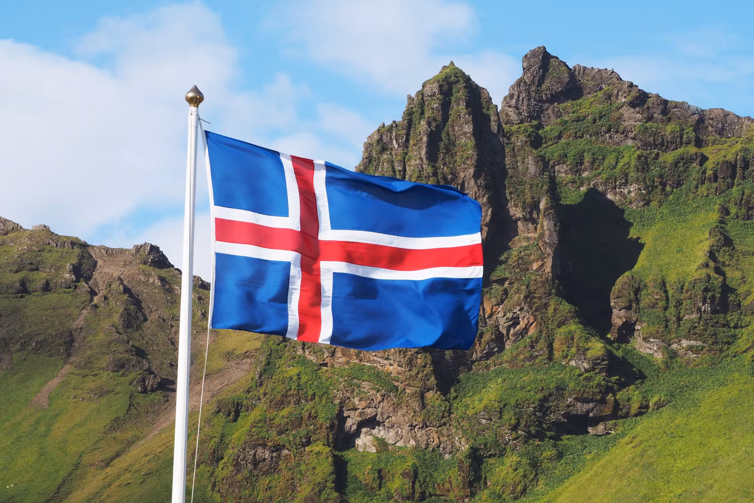 iceland-flag-mountains-sky